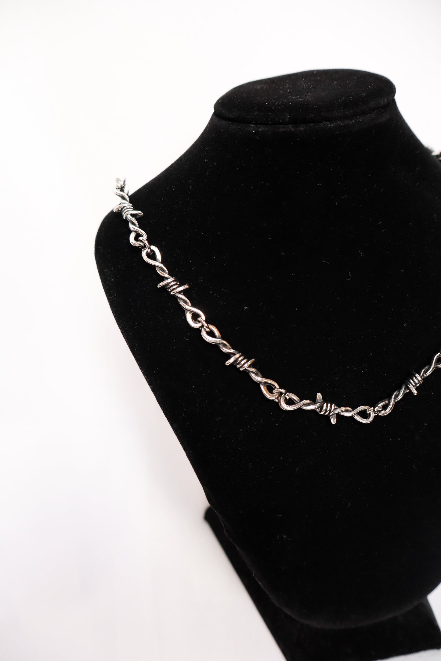 Collar de puas plateado