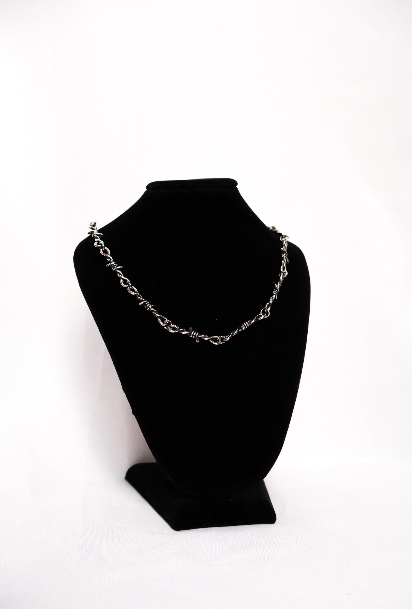 Collar de puas plateado