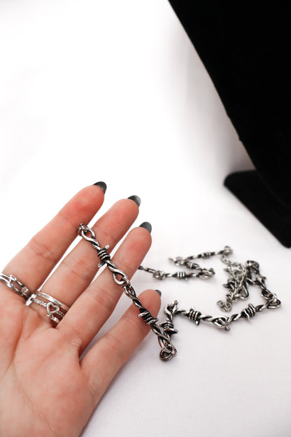 Collar de puas plateado